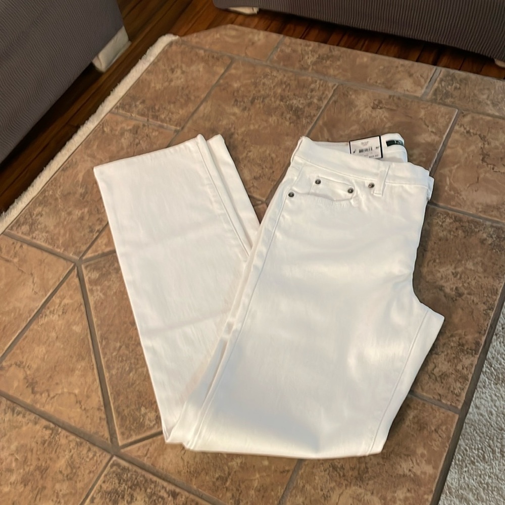 Never worn Ralph Lauren white denim jeans.  Size 8 with 32 inseam.